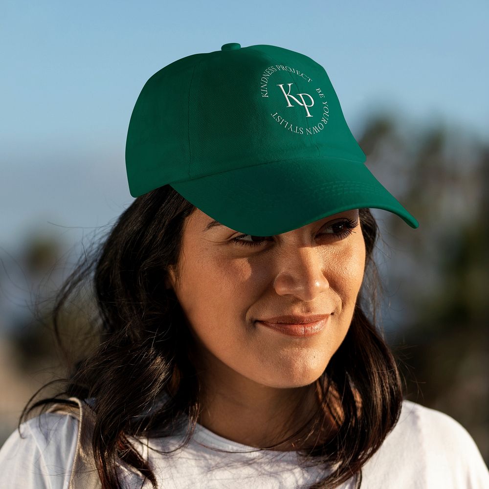 Beautiful Latina woman wearing a green hat