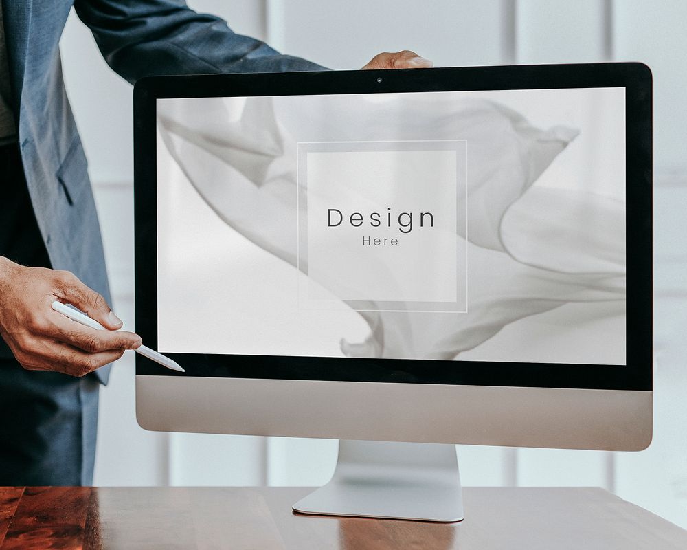 Businessman presenting a project on a computer desktop mockup