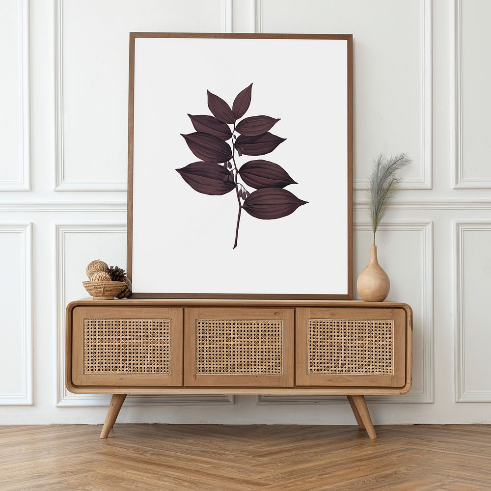 Picture frame mockup psd on a rattan cabinet