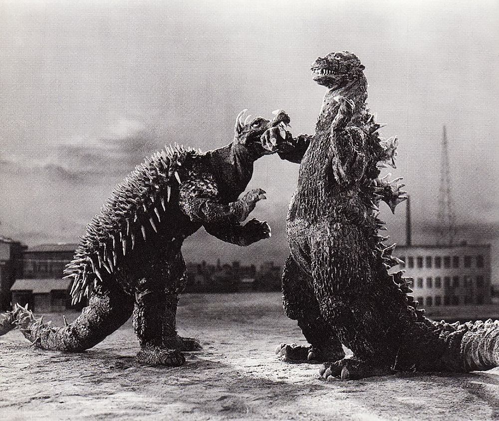 Promotional image from Godzilla Raids Again. Anguirus left, Godzilla right (1955) by Toho Company Ltd. Original public…
