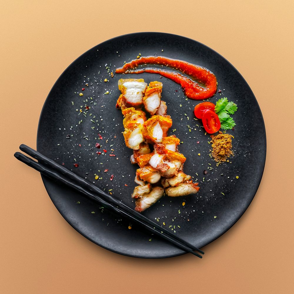 Fried crispy pork on a plate, plating food, fine dining photography