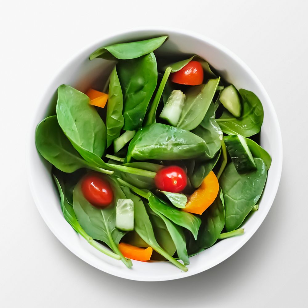 Spinach salad in a bowl, food photography psd