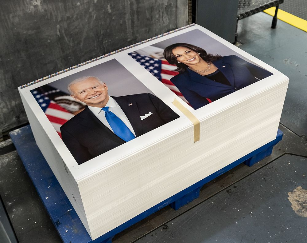 Stacks of the official portraits of President Joe Biden and Vice President Kamala Harris are seen at the Government Printing…