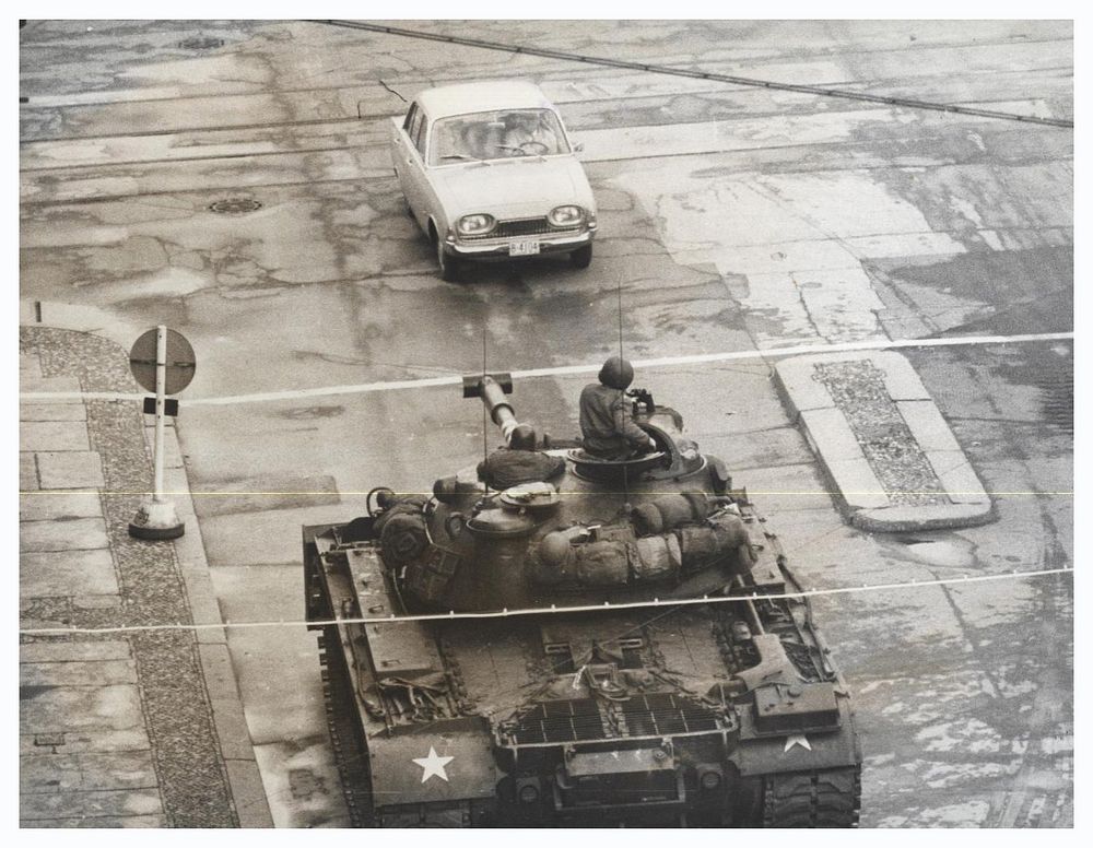 U.S. Tank at Checkpoint CharlieOct. 26, 1961. A U.S. tank stands guard at the border, indicated by the white line, as a car…