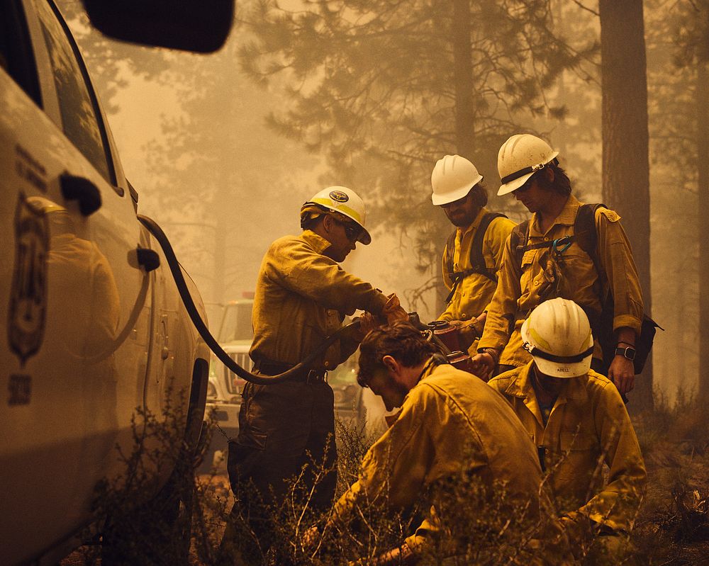 Team prepares with fuel for a controlled burn outside of Redmond, OR. Original public domain image from Flickr