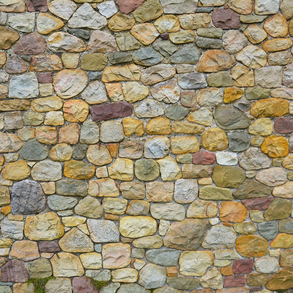 Cobblestones wall texture background, close up design