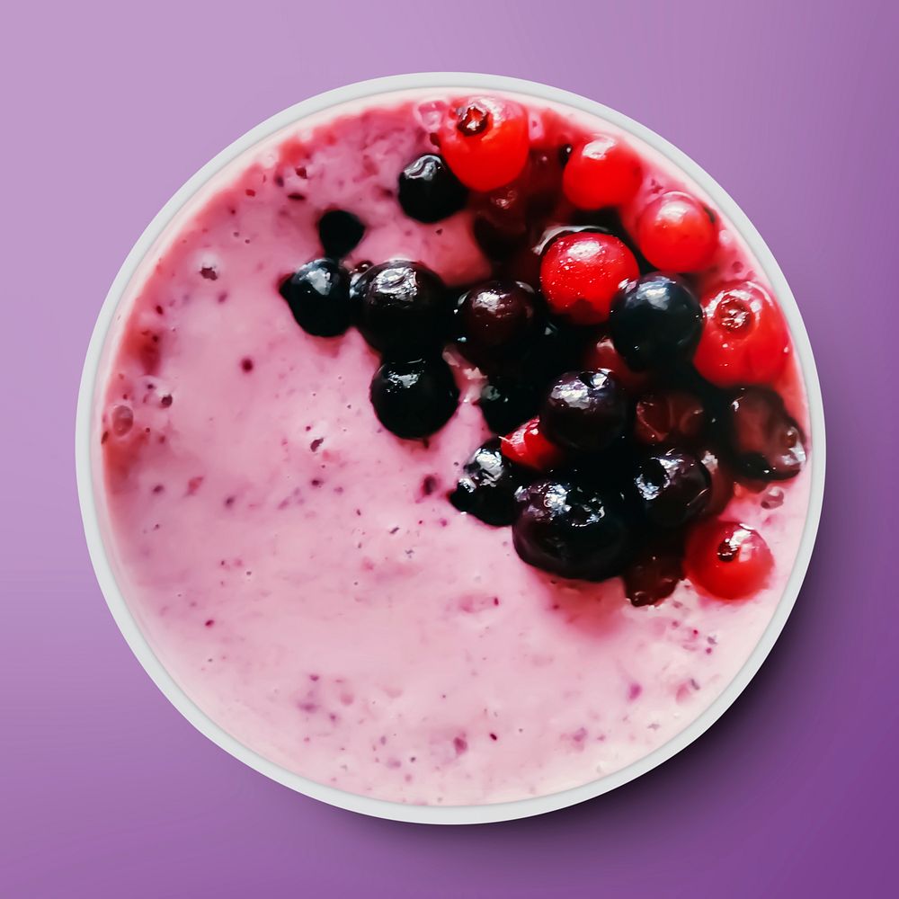 Smoothie bowl on purple background, food photography, flat lay style