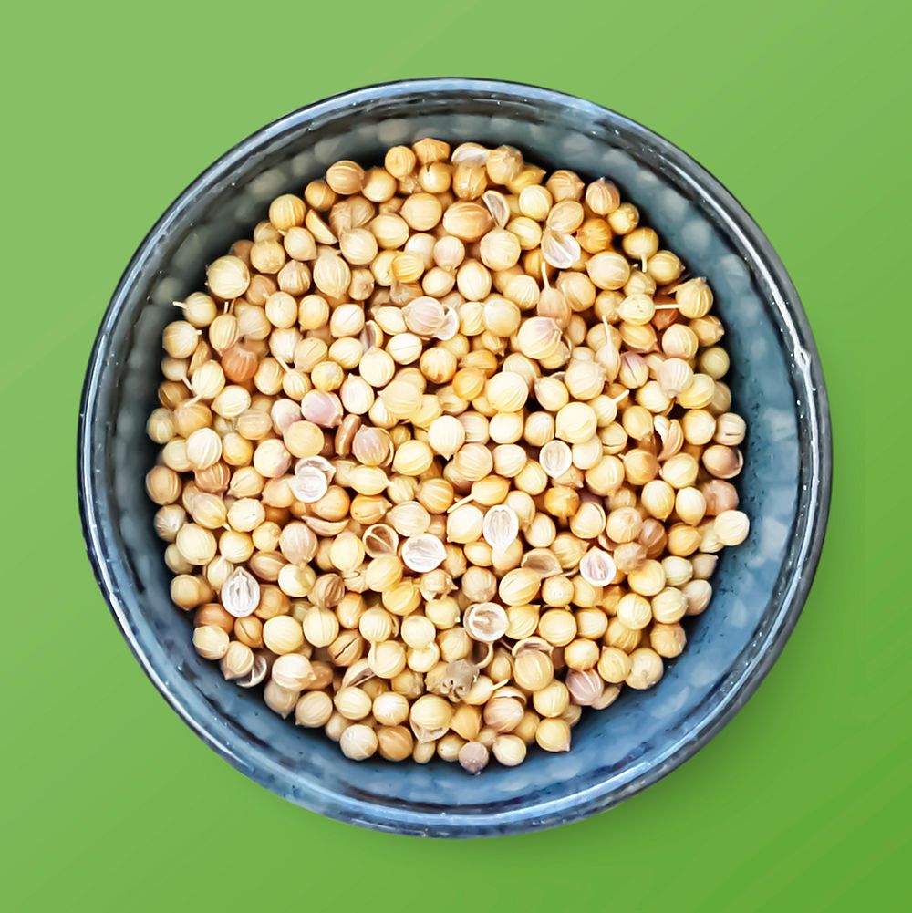 Coriander seeds in a bowl, food photography psd
