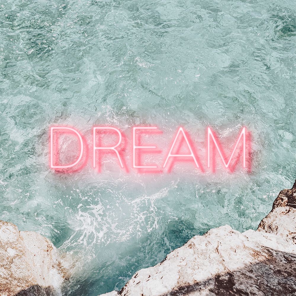 Psd dream pink neon word font on sea background