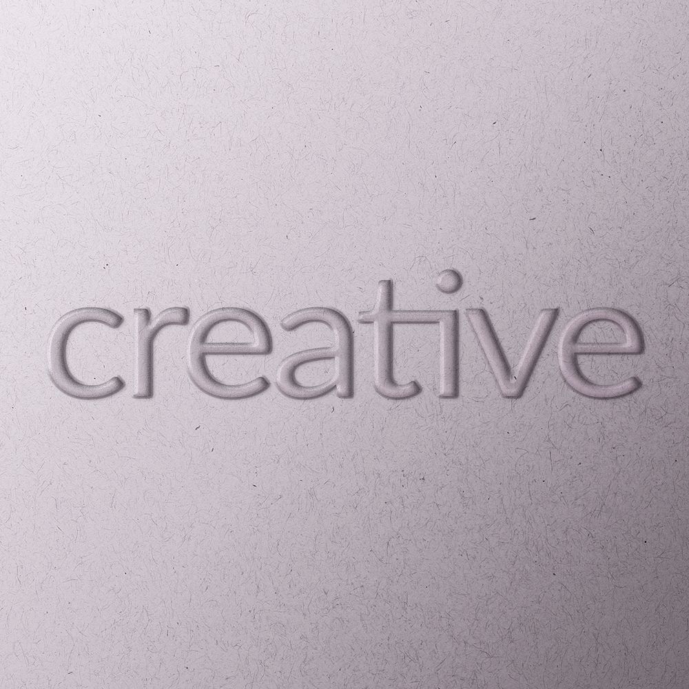 Creative emboss typography psd on paper texture
