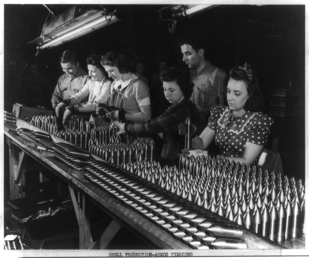 Aluminum paint production. Women work alongside of men in this Midwest aluminum factory now converted to production of war…