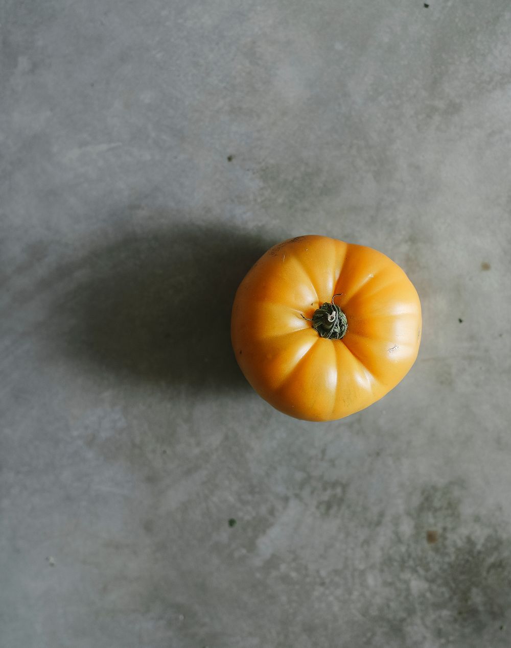 Fresh organic yellow heirloom tomato