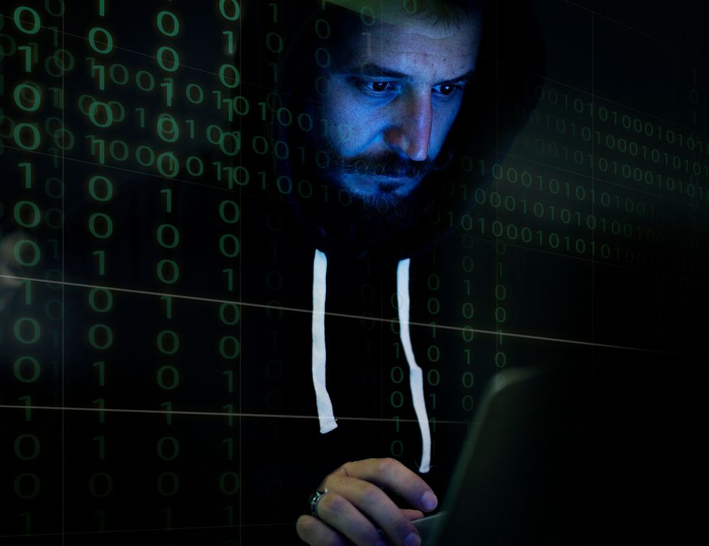 Hacker working on computer cyber crime