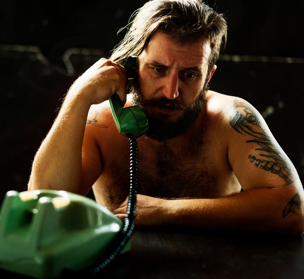 Man using telephone on tension talking 