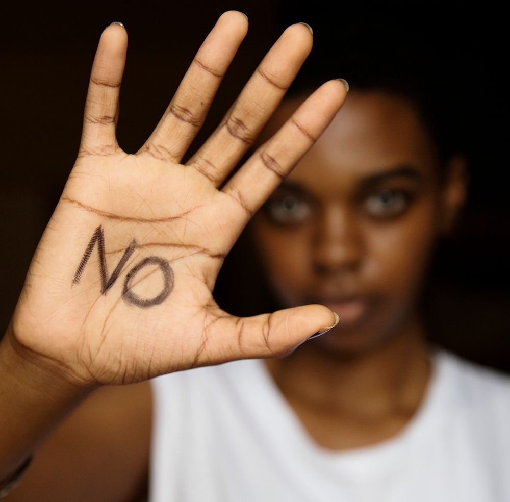 Closeup of woman hand written with no word on palm