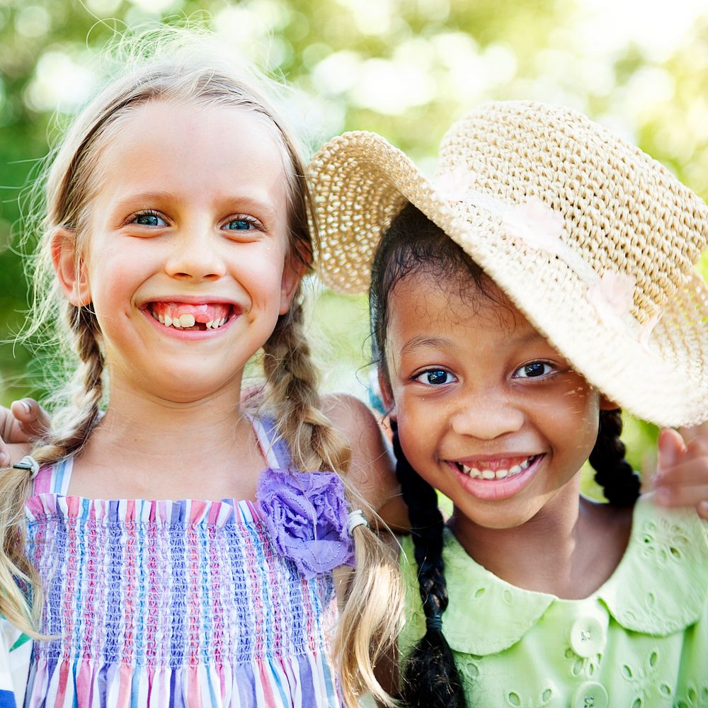 Diverse ethnic little girl friends happy together