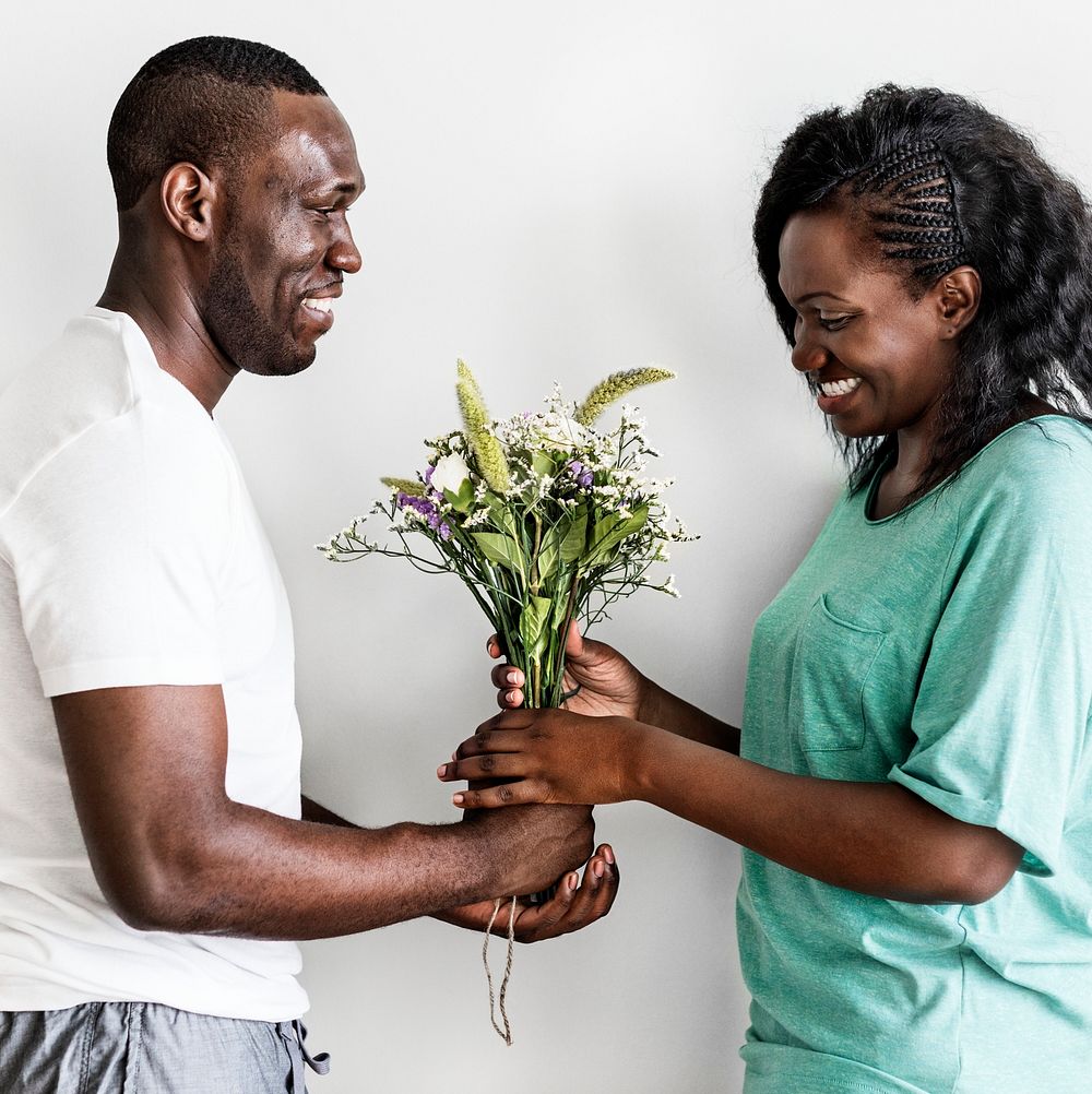 Wife receives a bouquet of flowers from her husband