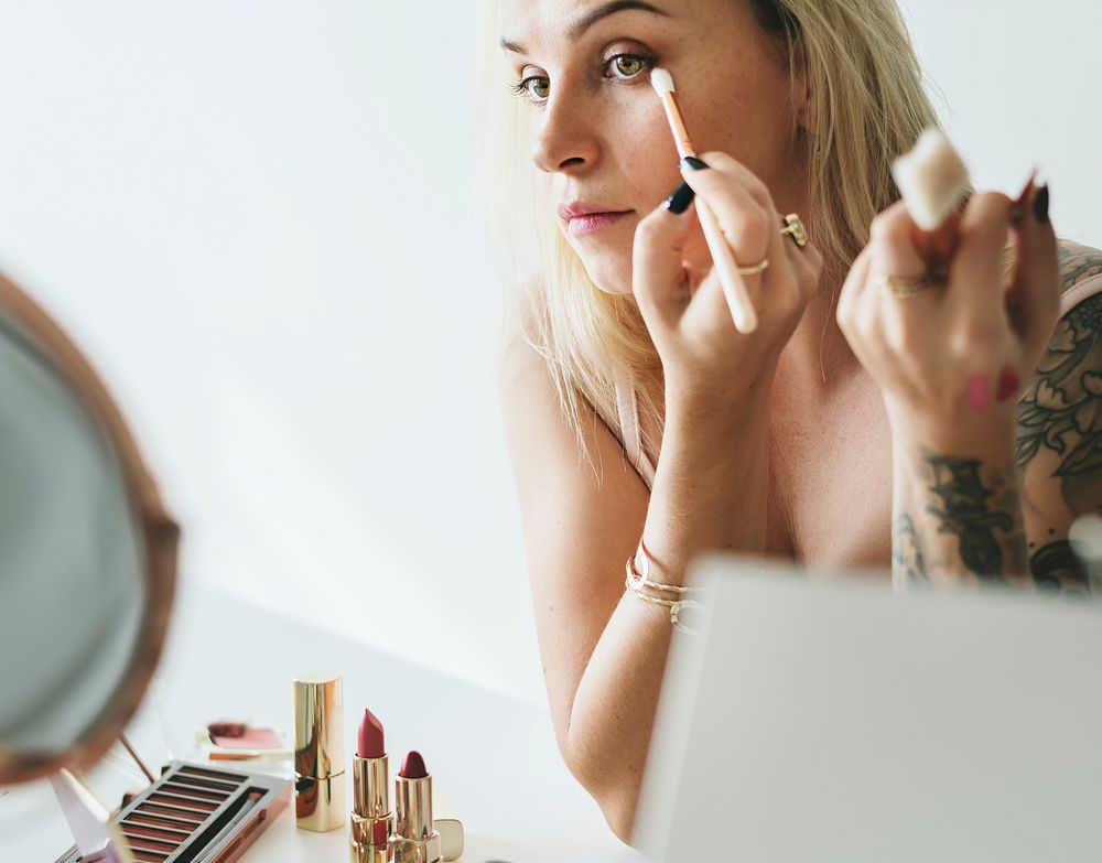 Beauty blogger doing makeup tutorial