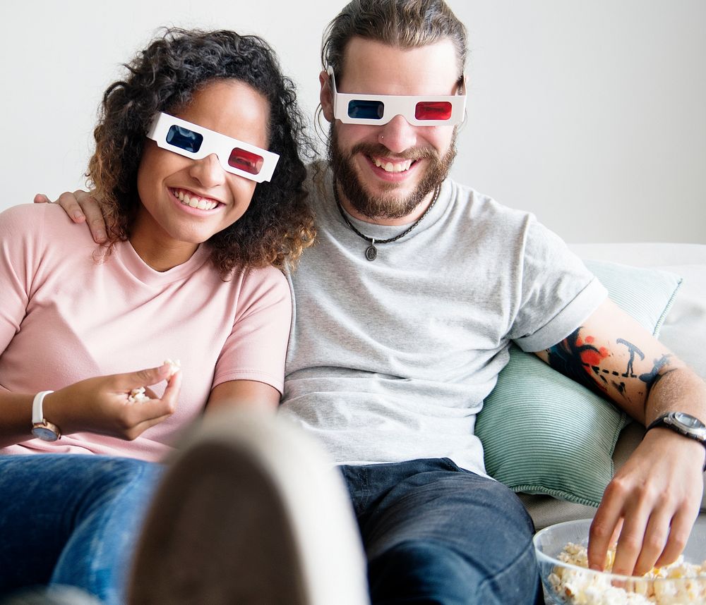 Couple watching 3D movie together