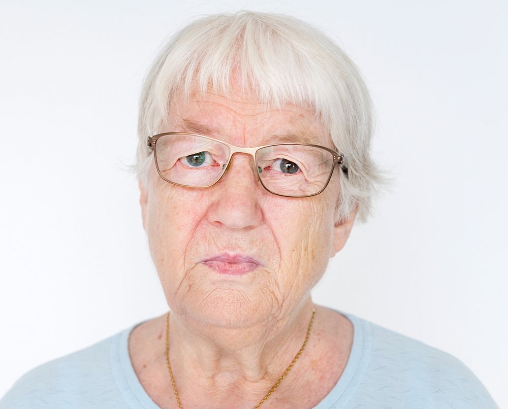 Portrait of serious white elderly woman