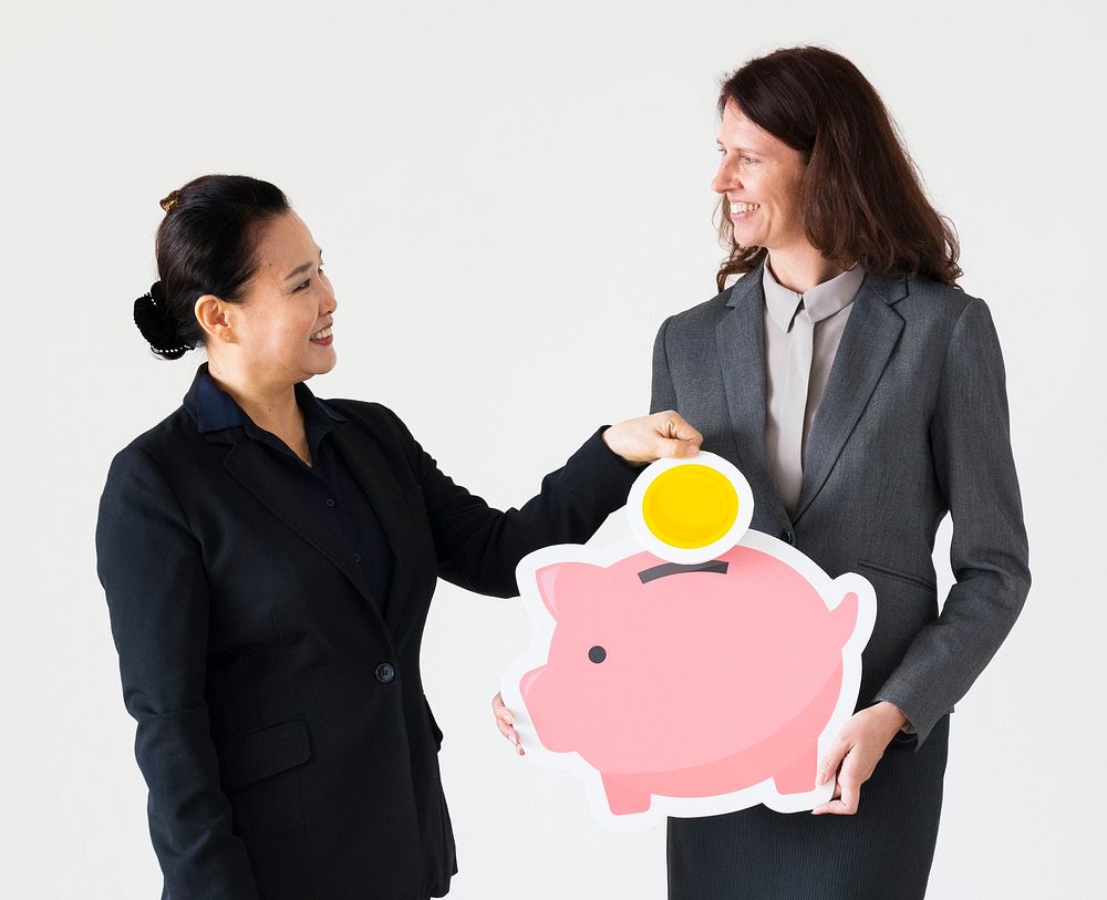Businesswomen holding piggybank icon