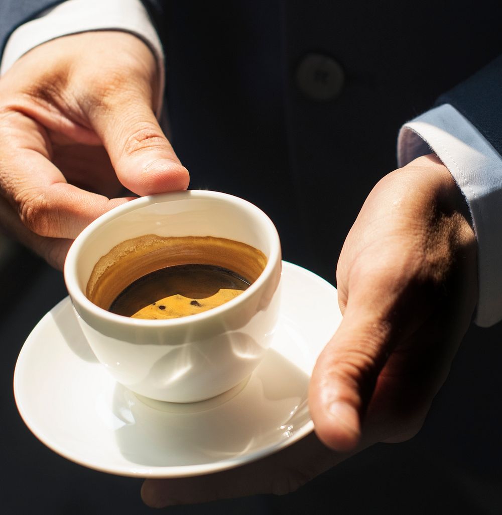 Businessman with a cup of hot coffee