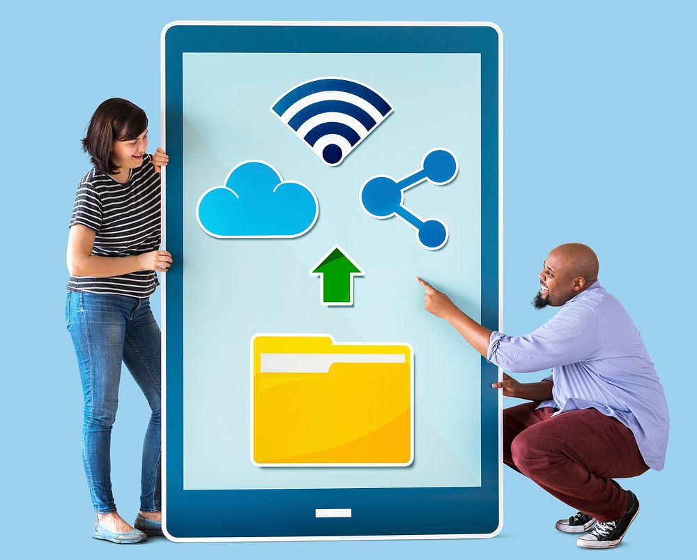 Diverse couple holding a tablet with graphics
