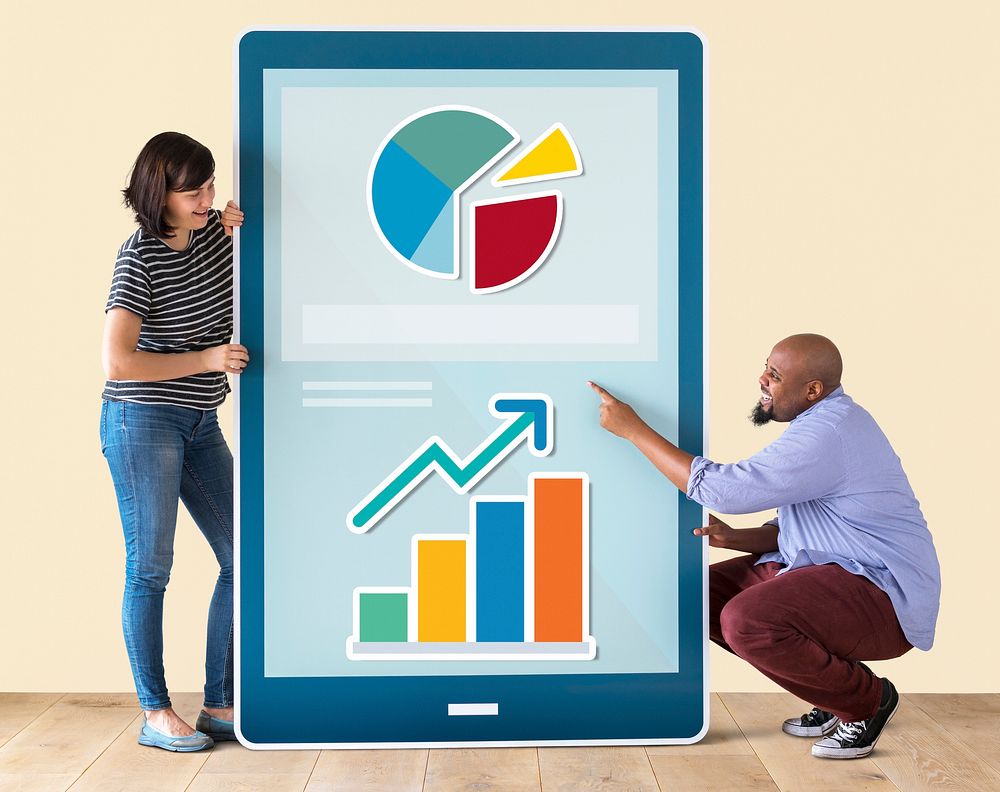 Diverse couple of people holding a tablet