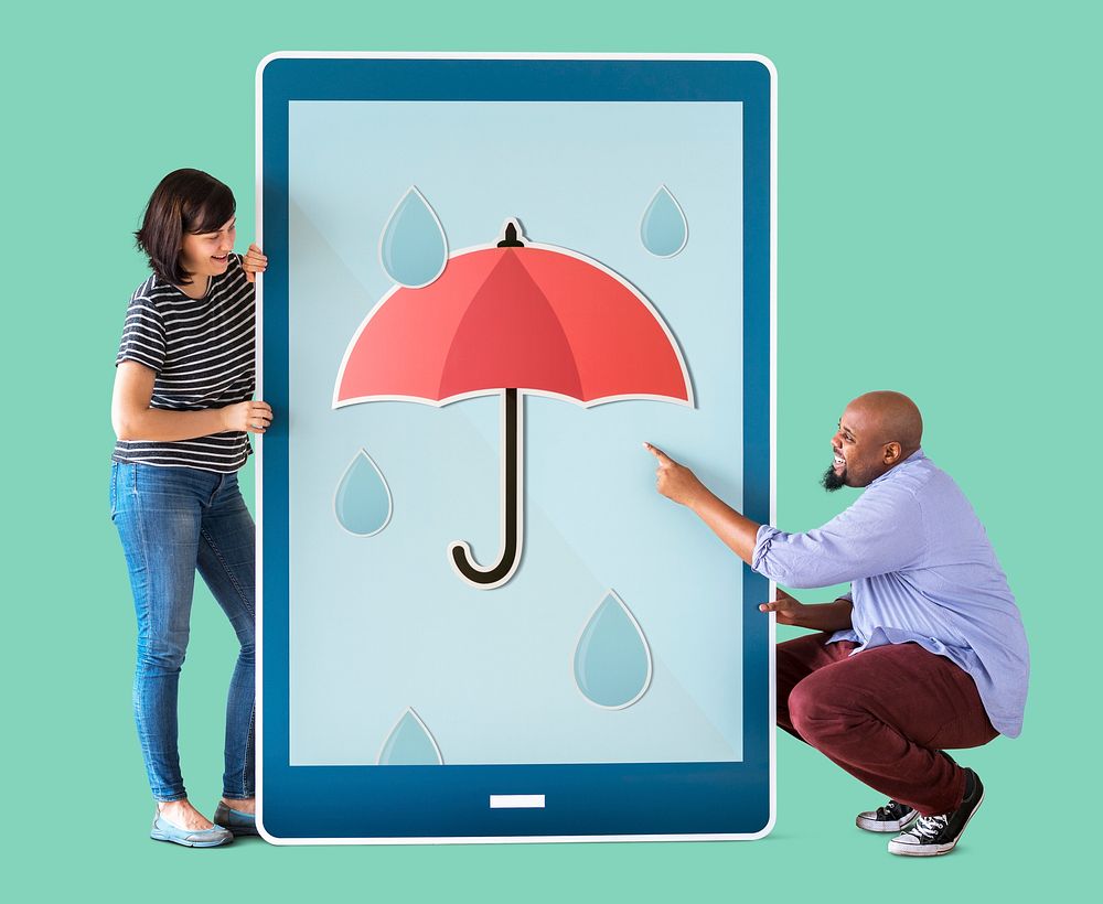 Diverse couple of people holding a tablet