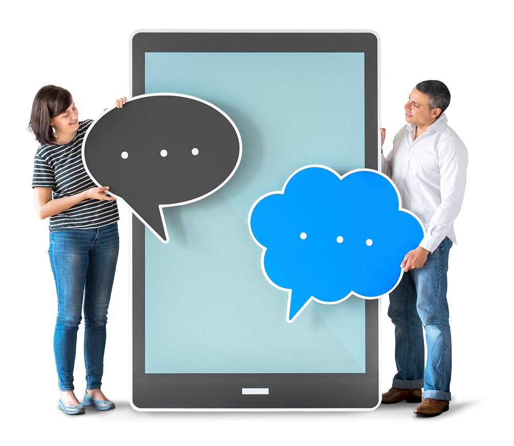 Diverse people holding speech bubbles and tablet