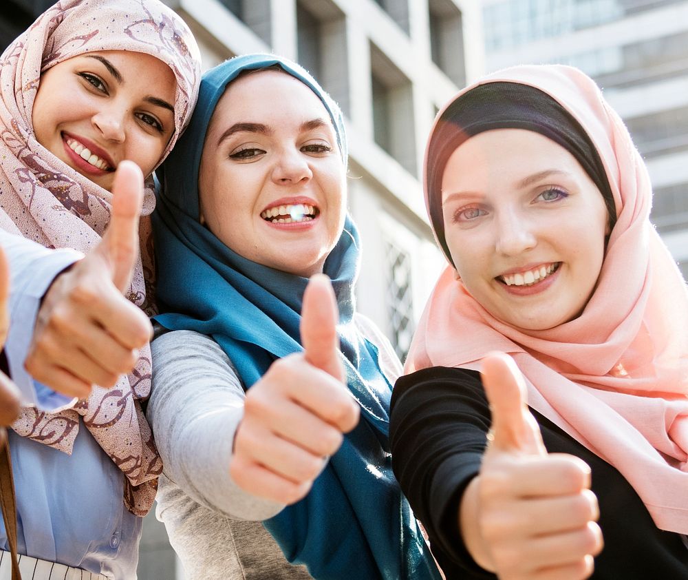 Group of islamic women gesturing thumps up