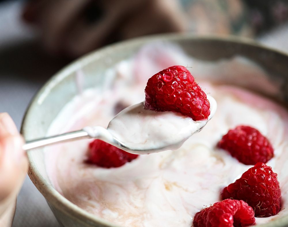 Closeup of raspberry yogurt in a bowl