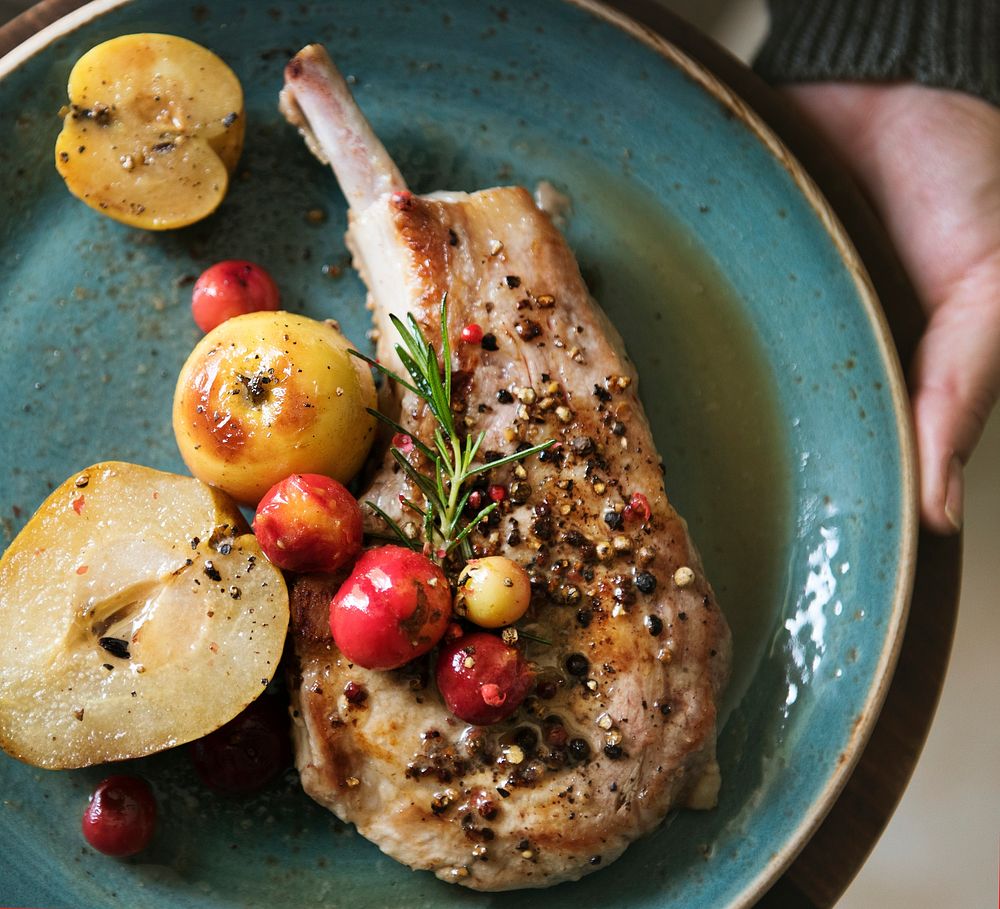Pork chop served with apples food photography recipe idea