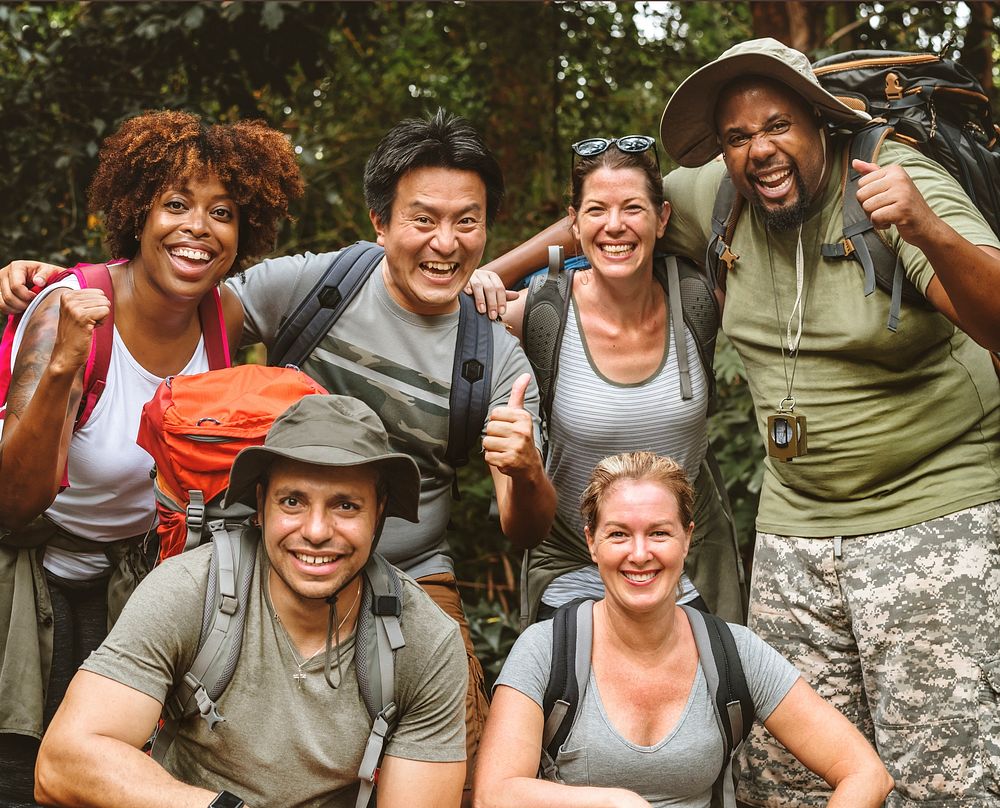 Group of diverse friends trekking together