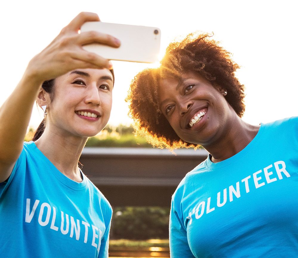 Diverse volunteers taking a selfie together