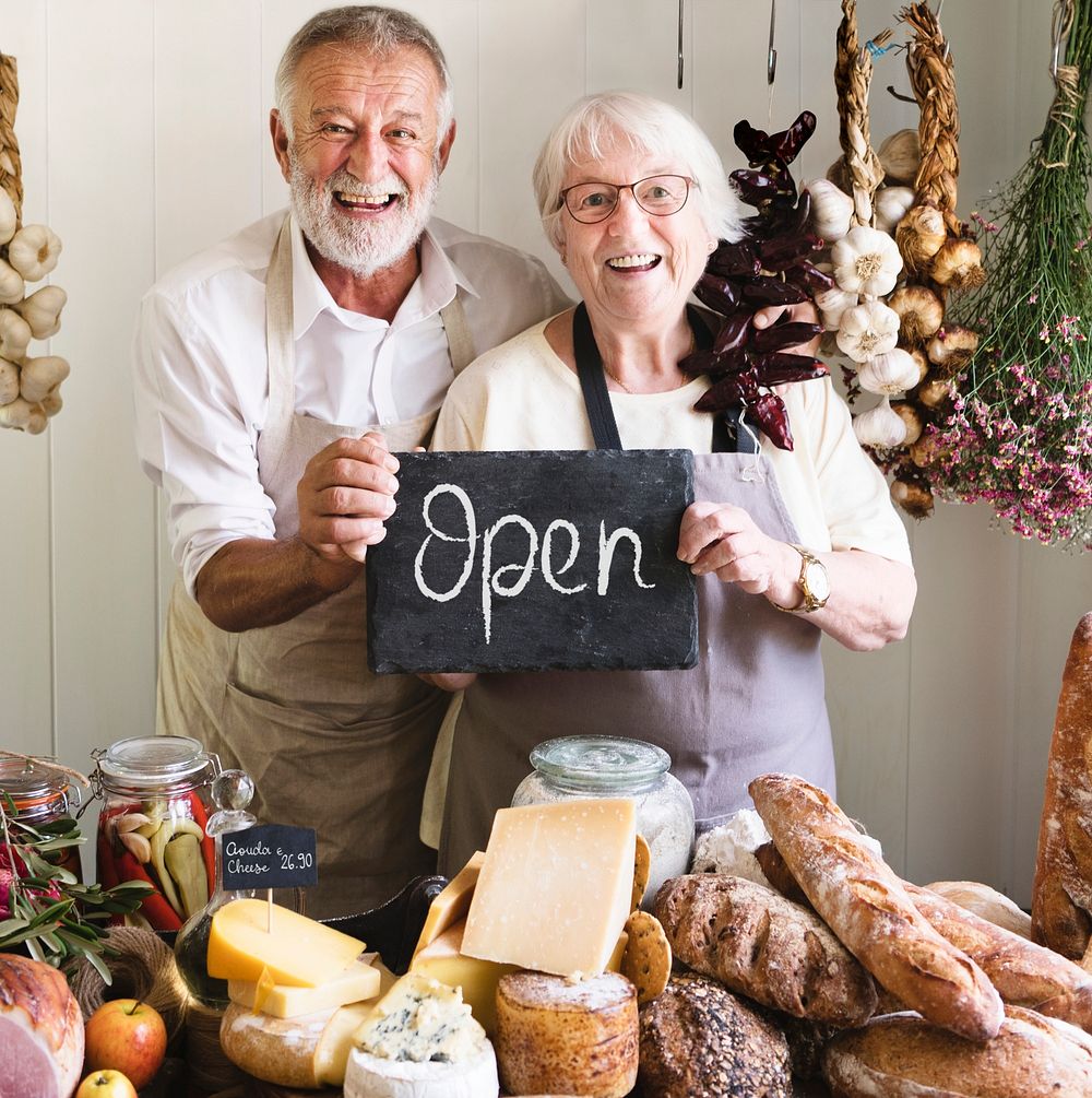 Senior couple working at a farm shop