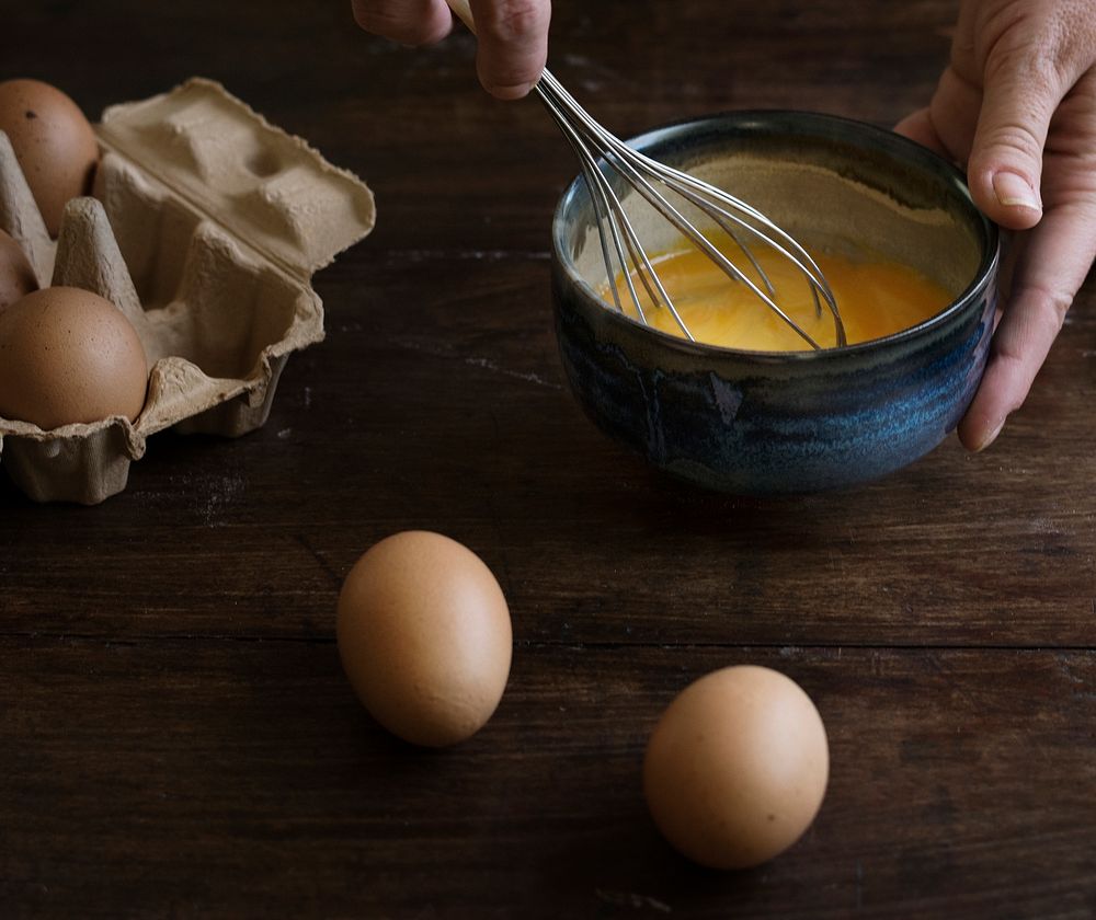 Woman whisking eggs food photography recipe idea