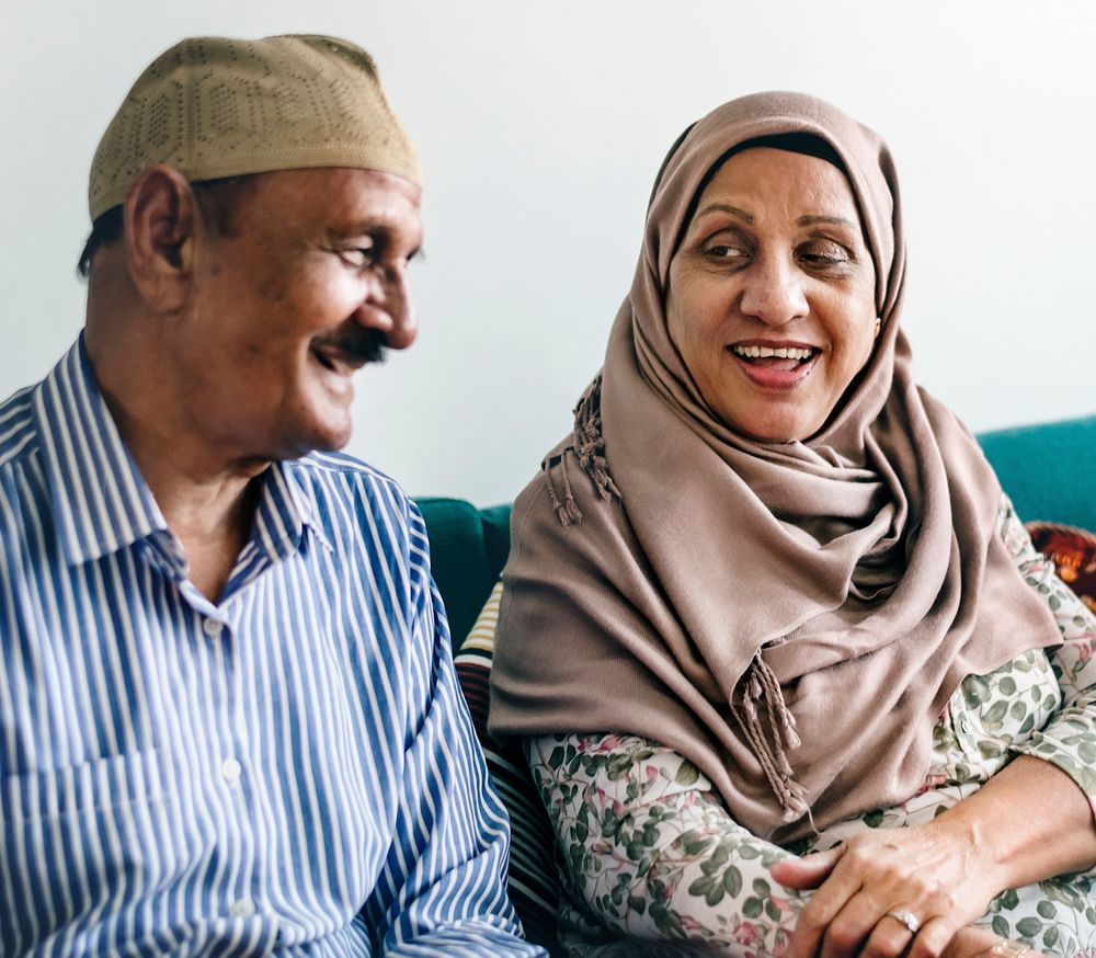Mature Muslim couple at home