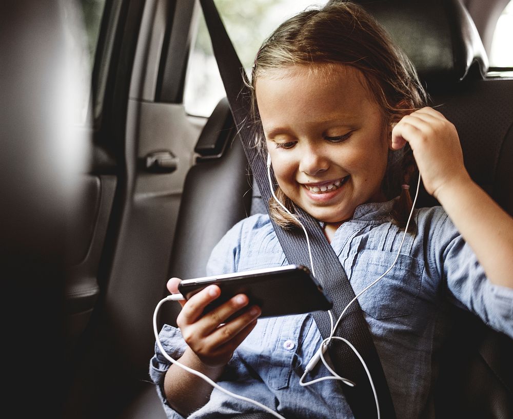 Girl listening to music in the car