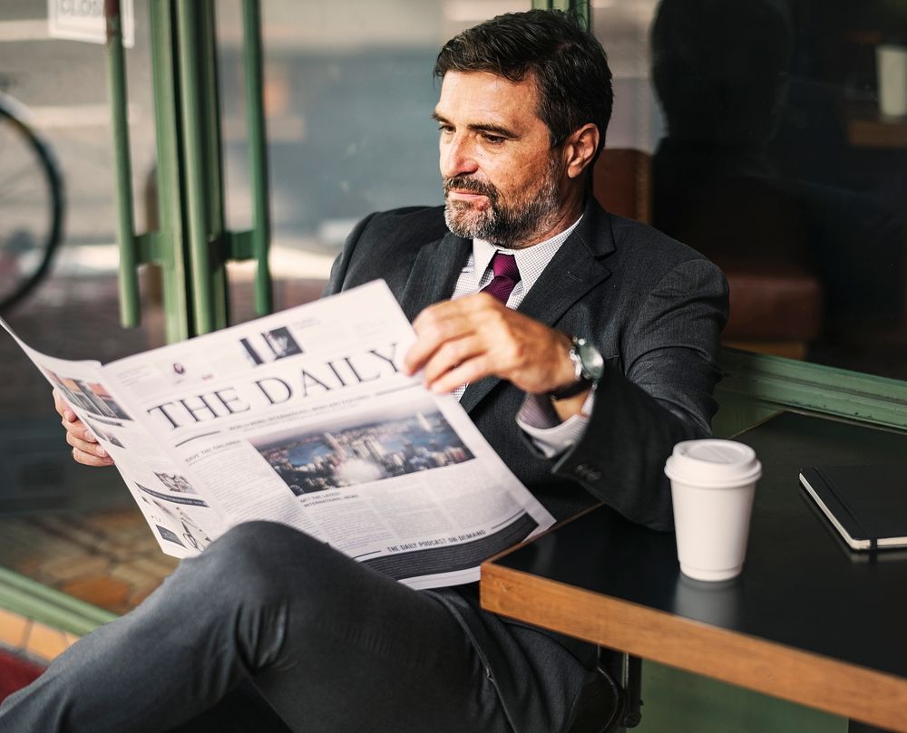 Businessman reading the daily news