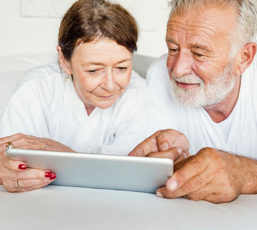 Mature couple using a tablet