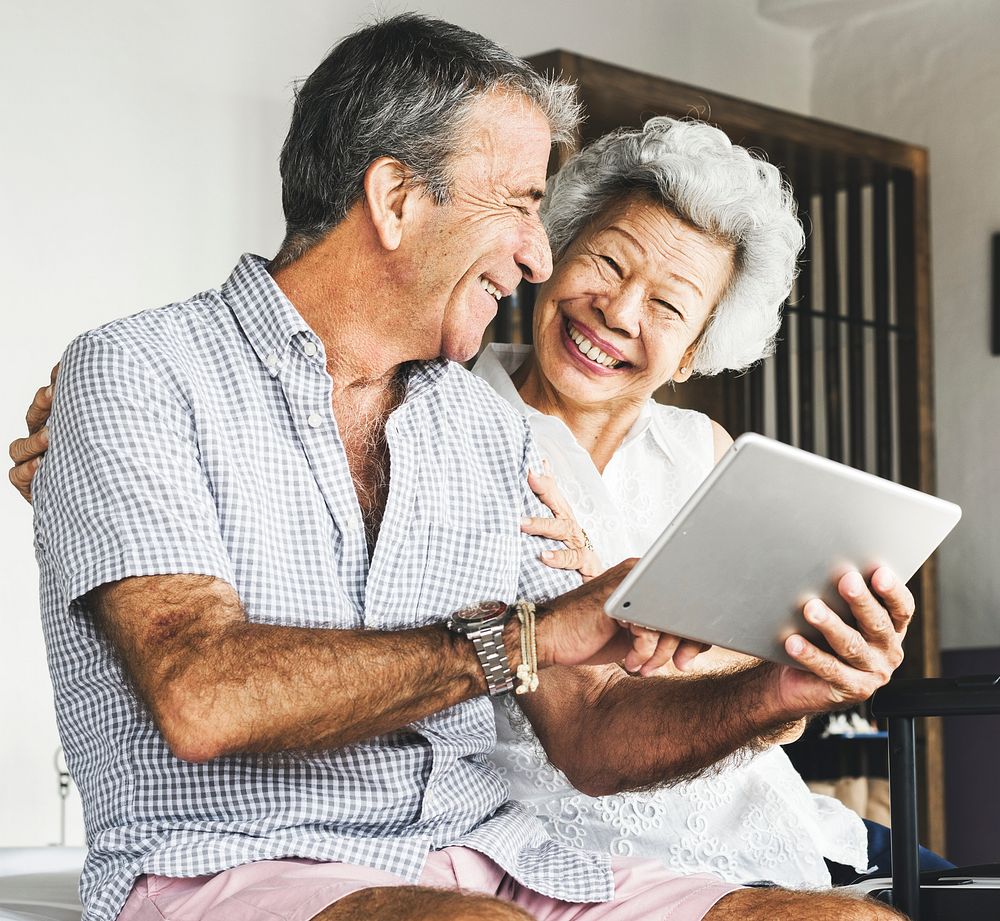 Mature couple using a tablet