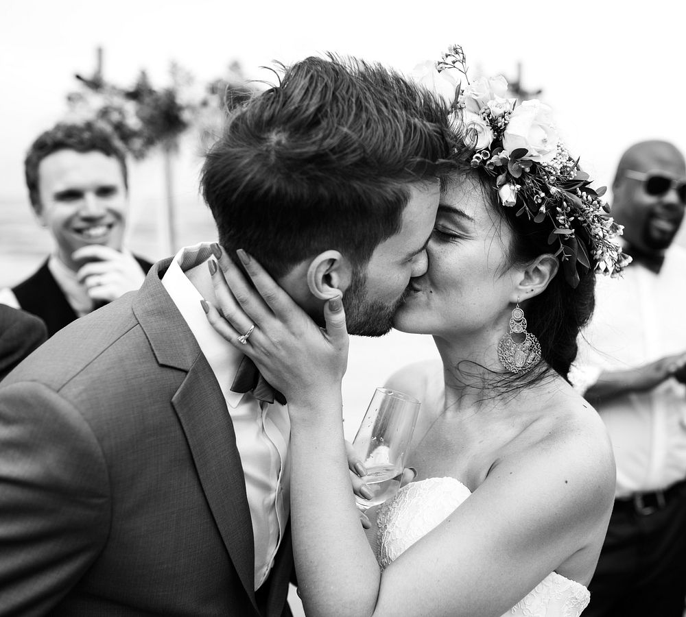 Wedding couple kissing each other
