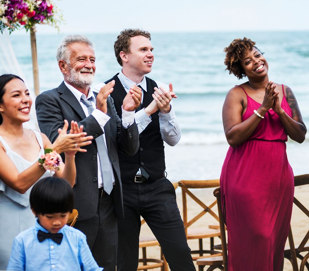 Wedding guests applauding at the wedding