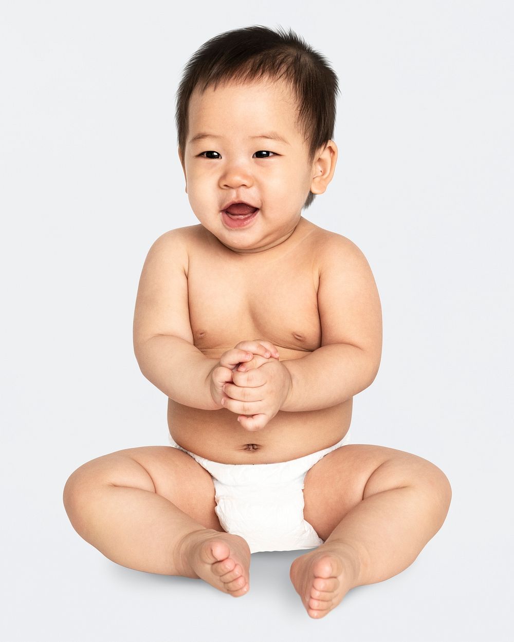 Cheerful baby in a studio