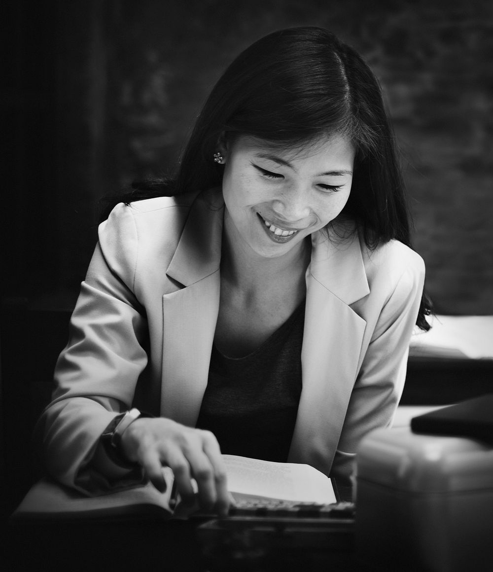 Cheerful asian business woman