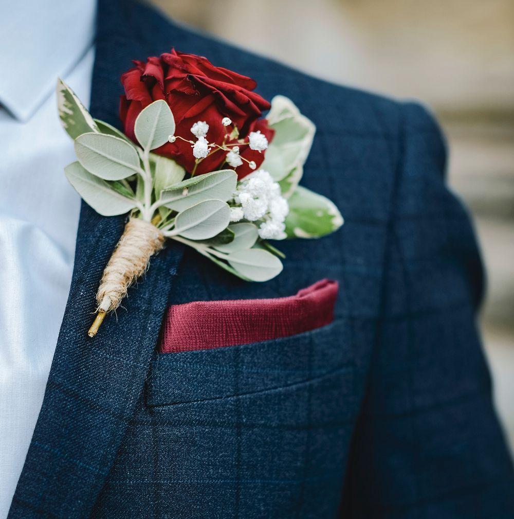 Close up of a groom with a boutonniere