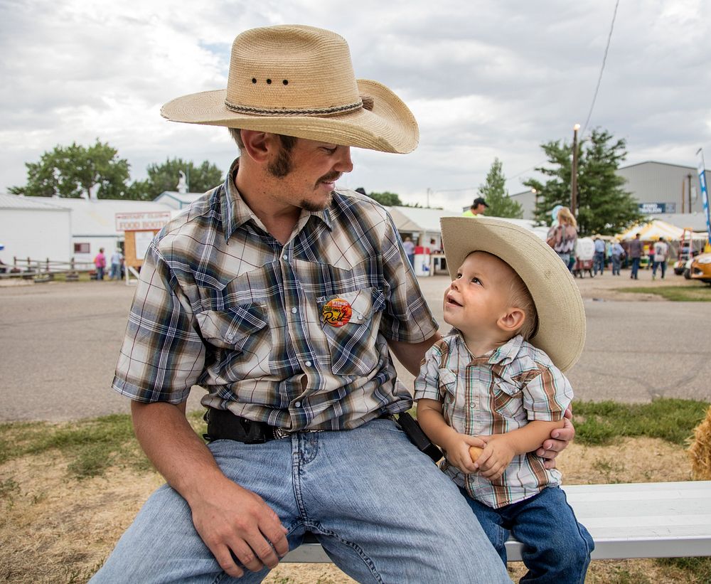 A man and his son, at the Wyoming State Fair in Douglas.