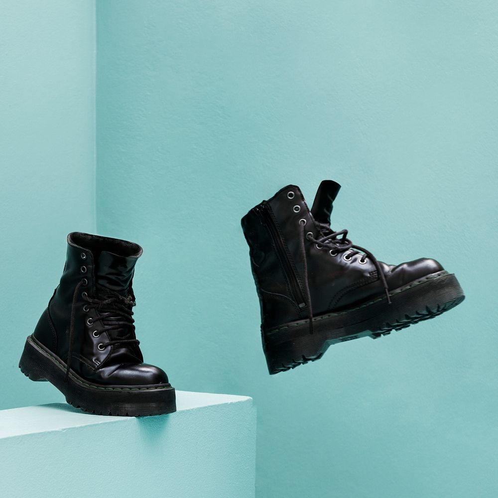 Cool combat boots with blue background