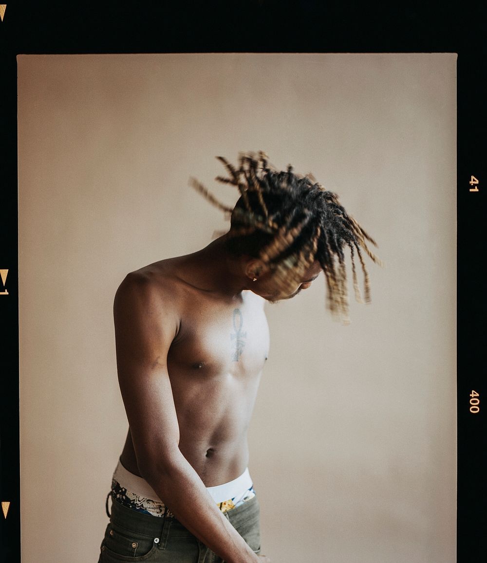 Black male model in a studio photoshoot